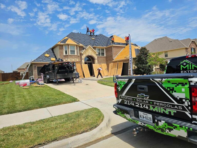 The MINT Exteriors team working on replacing a roof near Waxahachie, TX.
