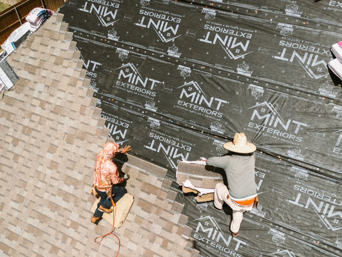MINT Exteriors replacing a roof