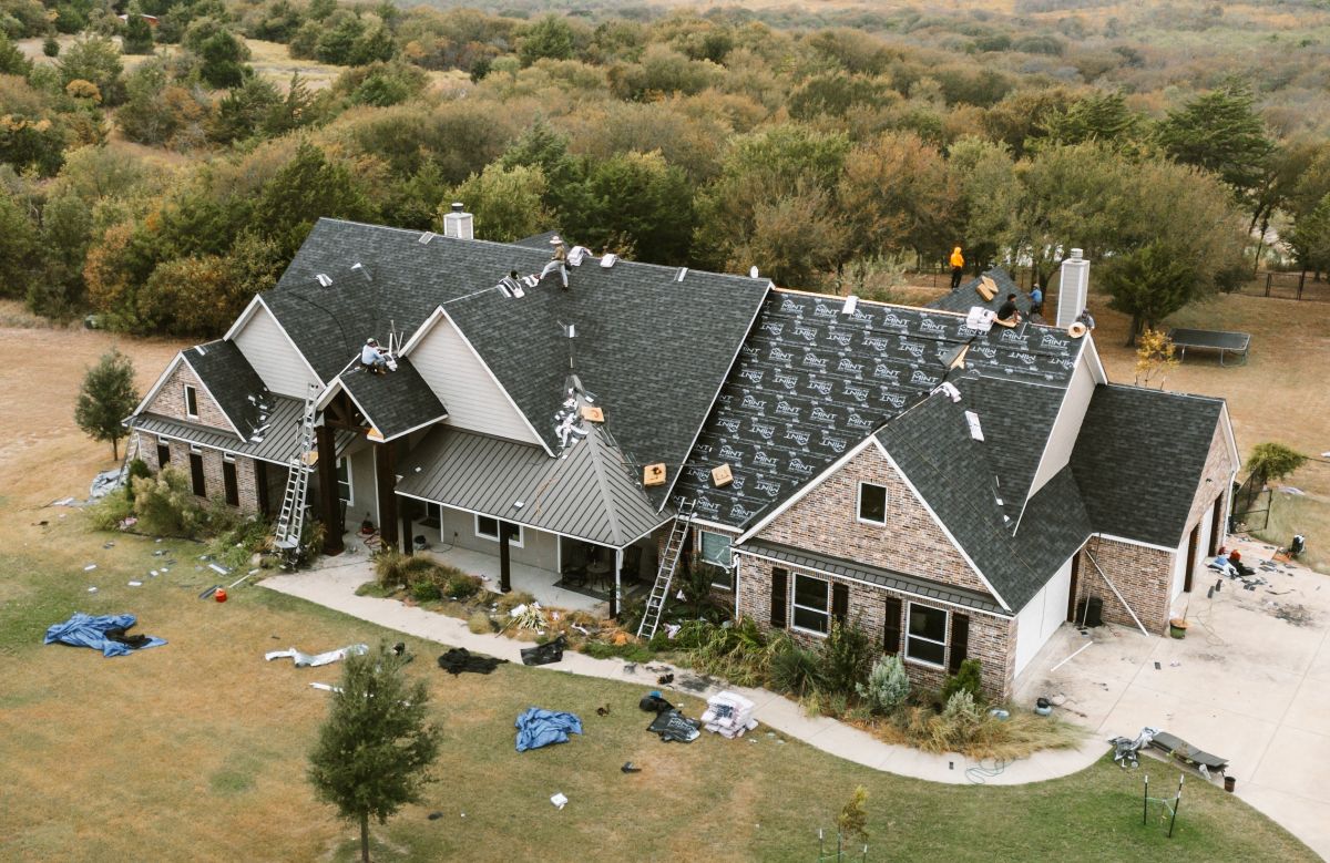 A roof being replaced by MINT Exteriors