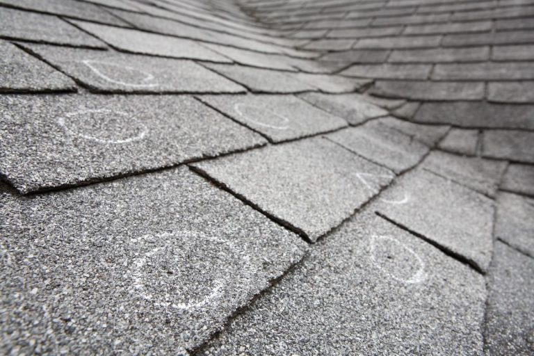 small holes on shingles roof after hail damage hail damage roof repair